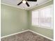 Bright bedroom with two windows and ceiling fan at 808 Trail One, Burlington, NC 27215