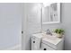 Bathroom with white vanity and updated fixtures at 81 Churchwood Ln, Pittsboro, NC 27312