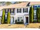 Attractive exterior of townhome with landscaping and walkway at 100 Stratford Lakes Dr # 306, Durham, NC 27713