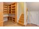 Basement with built-in shelving, staircase, and extra storage at 101 Songbird Ln, Chapel Hill, NC 27514