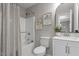 Clean bathroom with shower/tub combo, toilet and vanity at 1100 Pecan Pl, Durham, NC 27704