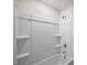 Clean bathroom featuring a bathtub and shelving at 1136 Middlecrest Dr, Rocky Mount, NC 27804