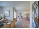 Open concept dining area with hardwood floors, view of kitchen and living room at 1140 Middlecrest Dr, Rocky Mount, NC 27804