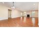 Spacious great room with hardwood floors and fireplace at 15 Rolling Meadows Ln, Chapel Hill, NC 27517