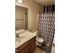 Clean bathroom with a shower/tub combo, toilet, and vanity at 1911 Huntley Way, Burlington, NC 27215