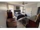 Spacious bedroom with dark blue upholstered bed and dresser at 2320 Spruce Shadows Ln, Raleigh, NC 27614