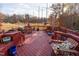 Large deck with grill, seating, and open space at 2320 Spruce Shadows Ln, Raleigh, NC 27614