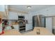 Kitchen with white cabinets, stainless steel appliances, and butcher block countertops at 2434 Orice St, Burlington, NC 27215