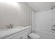 Clean bathroom with white tile shower, bathtub, and vanity at 262 Homestead Dr, Selma, NC 27576