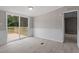 Bright dining area with sliding glass doors leading to a deck at 262 Homestead Dr, Selma, NC 27576