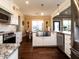 Modern kitchen with a farmhouse sink, stainless steel appliances, and white cabinetry at 297 Denvale Dr, Selma, NC 27576