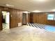 Basement with wood paneling and checkerboard floor at 342 Dare St, Burlington, NC 27217