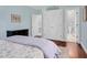 Comfortable bedroom with hardwood floors, en-suite bathroom access, and ample closet space at 4027 Green Forest Ct, Rocky Mount, NC 27804