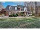 Brick two-story house with a large front porch and landscaped yard at 4027 Green Forest Ct, Rocky Mount, NC 27804