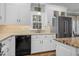 Kitchen features white cabinets, granite countertops, and stainless steel appliances at 4027 Green Forest Ct, Rocky Mount, NC 27804