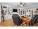 Spacious living room with built-in shelving, fireplace, and hardwood floors at 4027 Green Forest Ct, Rocky Mount, NC 27804