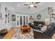 Relaxing living room with hardwood floors, built-in shelving and fireplace at 4027 Green Forest Ct, Rocky Mount, NC 27804