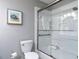 A clean bathroom with a shower/tub combo and neutral colors at 4209 Redington, Raleigh, NC 27609