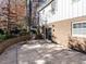 Spacious patio situated beside the house with a wooded view at 4209 Redington, Raleigh, NC 27609