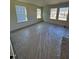 Large bedroom with new carpeting and windows offering a community view at 432 La Maison Ave # 13, Wendell, NC 27591