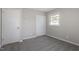 Spacious bedroom with neutral walls and carpet at 609 E Cockrell St, Nashville, NC 27856