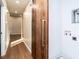 Convenient laundry area with barn door and space for washer/dryer at 6625 Suburban Dr, Raleigh, NC 27615