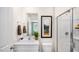 Clean bathroom with a walk-in shower and vanity at 8656 Brixton Shay Dr, Raleigh, NC 27616