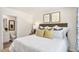 Main bedroom with ensuite bathroom access and a window at 8656 Brixton Shay Dr, Raleigh, NC 27616