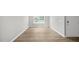 Spacious bonus room with wood-look flooring at 8656 Brixton Shay Dr, Raleigh, NC 27616