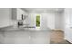 Kitchen with granite countertops and breakfast bar at 8656 Brixton Shay Dr, Raleigh, NC 27616