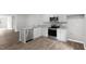 Modern kitchen featuring stainless steel appliances and granite countertops at 8656 Brixton Shay Dr, Raleigh, NC 27616