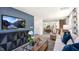 Open concept living room with a view of the kitchen and staircase at 8656 Brixton Shay Dr, Raleigh, NC 27616