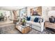 Living room with a comfy couch and large artwork at 8656 Brixton Shay Dr, Raleigh, NC 27616