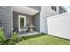 Private patio with small table and chair, offering a relaxing outdoor space at 8656 Brixton Shay Dr, Raleigh, NC 27616
