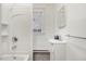 Clean bathroom with white vanity, bathtub, and shower at 923 Belvedere St, Rocky Mount, NC 27803