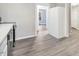 Updated kitchen with white cabinets, stainless steel appliances and vinyl flooring at 923 Belvedere St, Rocky Mount, NC 27803