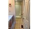 Bathroom with shower, vanity, and flooring at 6232 Dawn Dr, Hurdle Mills, NC 27541