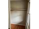 Walk-in closet with wood shelving and window at 6232 Dawn Dr, Hurdle Mills, NC 27541