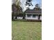 View of the house and detached shed in the backyard at 6232 Dawn Dr, Hurdle Mills, NC 27541