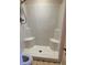 Clean shower with multiple shower seats at 6232 Dawn Dr, Hurdle Mills, NC 27541
