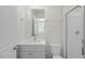 Clean bathroom with a shower/tub combo and updated vanity at 8658 Brixton Shay Dr, Raleigh, NC 27616