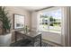 Home office with desk, chair, and view of the neighborhood at 8658 Brixton Shay Dr, Raleigh, NC 27616