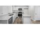 Modern kitchen featuring stainless steel appliances and granite countertops at 8658 Brixton Shay Dr, Raleigh, NC 27616
