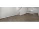 Open living area showcasing wood-look floors and staircase at 8658 Brixton Shay Dr, Raleigh, NC 27616