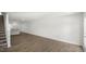 Spacious living room with hardwood floors and access to outdoor space at 8658 Brixton Shay Dr, Raleigh, NC 27616