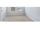Small bedroom with neutral wall paint and carpet at 901 Arnold Place Dr, Fuquay Varina, NC 27526