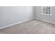 Bright bedroom with carpet and a window at 901 Arnold Place Dr, Fuquay Varina, NC 27526