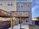 Home exterior with two-tiered deck and fenced backyard at 901 Arnold Place Dr, Fuquay Varina, NC 27526