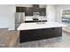 Modern kitchen with large island and stainless steel appliances at 901 Arnold Place Dr, Fuquay Varina, NC 27526