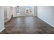 Bright living room with hardwood floors and large windows at 901 Arnold Place Dr, Fuquay Varina, NC 27526